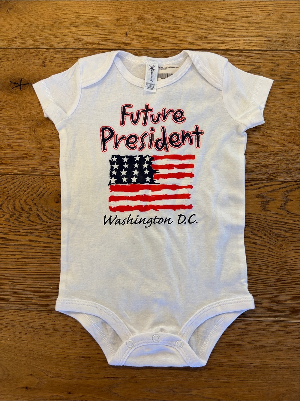 Delta White One-Piece with Red and Blue 'Future President' Graphic